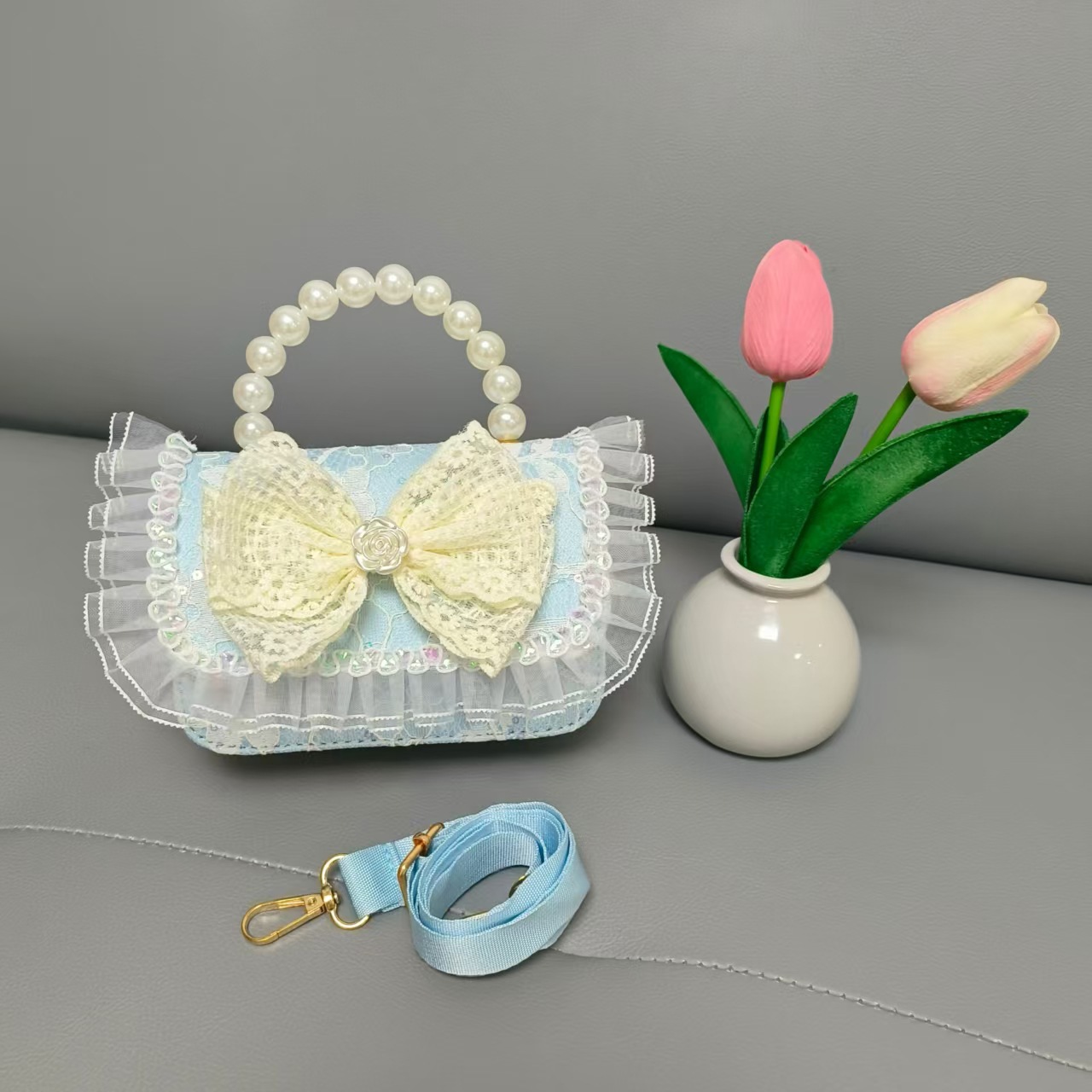 Bolso de princesa portátil de perlas, arco de encaje, bolso de hombro, bolso de cadena, bolso de cambio de Año Nuevo.