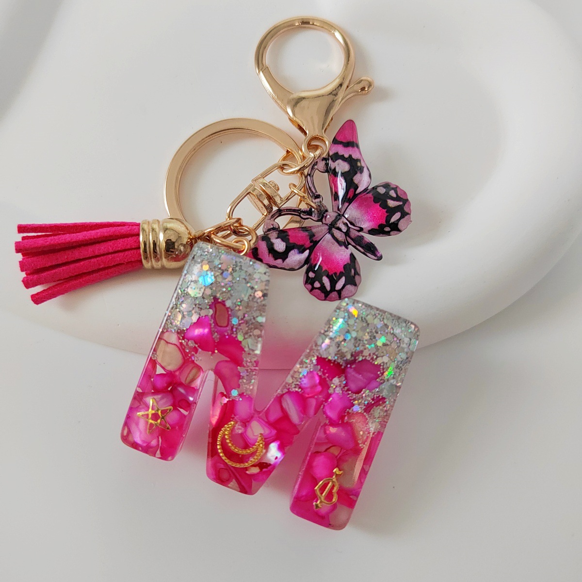 Inventario transfronterizo nueva resina bicolor mariposa borda llavero colgante estrella luna accesorios de joyas