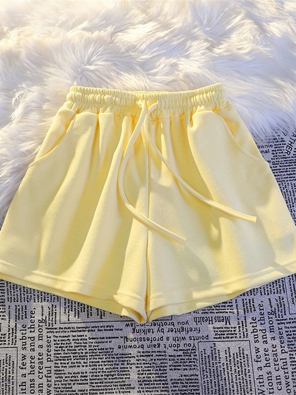 韓範夏レジャースポーツパンツ女性のゆったりとした家で寝ているズボンの外に薄い外国貿易の純色のショートパンツを着て卸売りします。