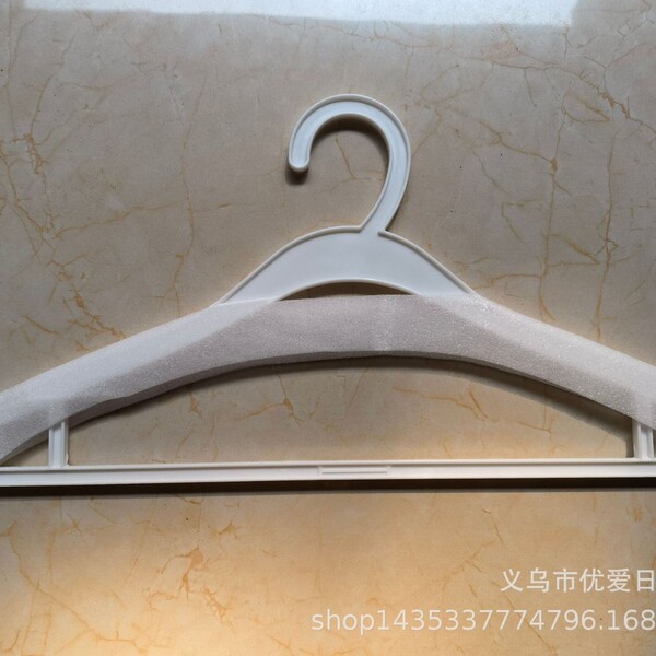 White disposable hanger