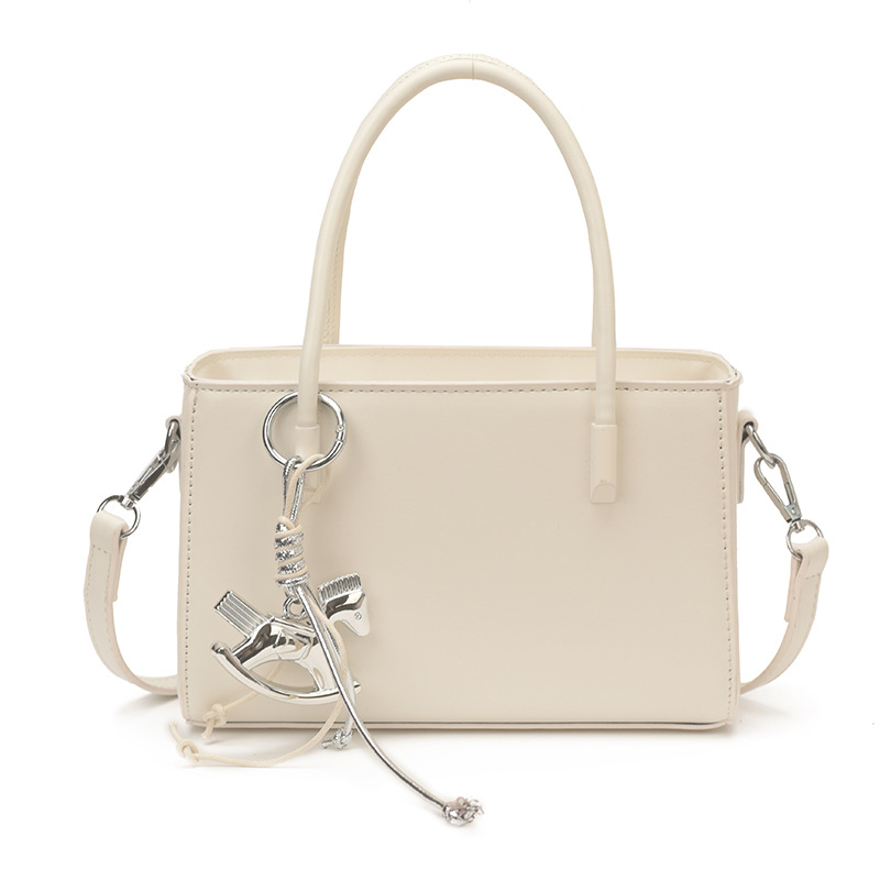Diseño coreano de nicho bolso de mano casual para mujeres 2026 verano diario nuevo estilo de moda bolso de transporte