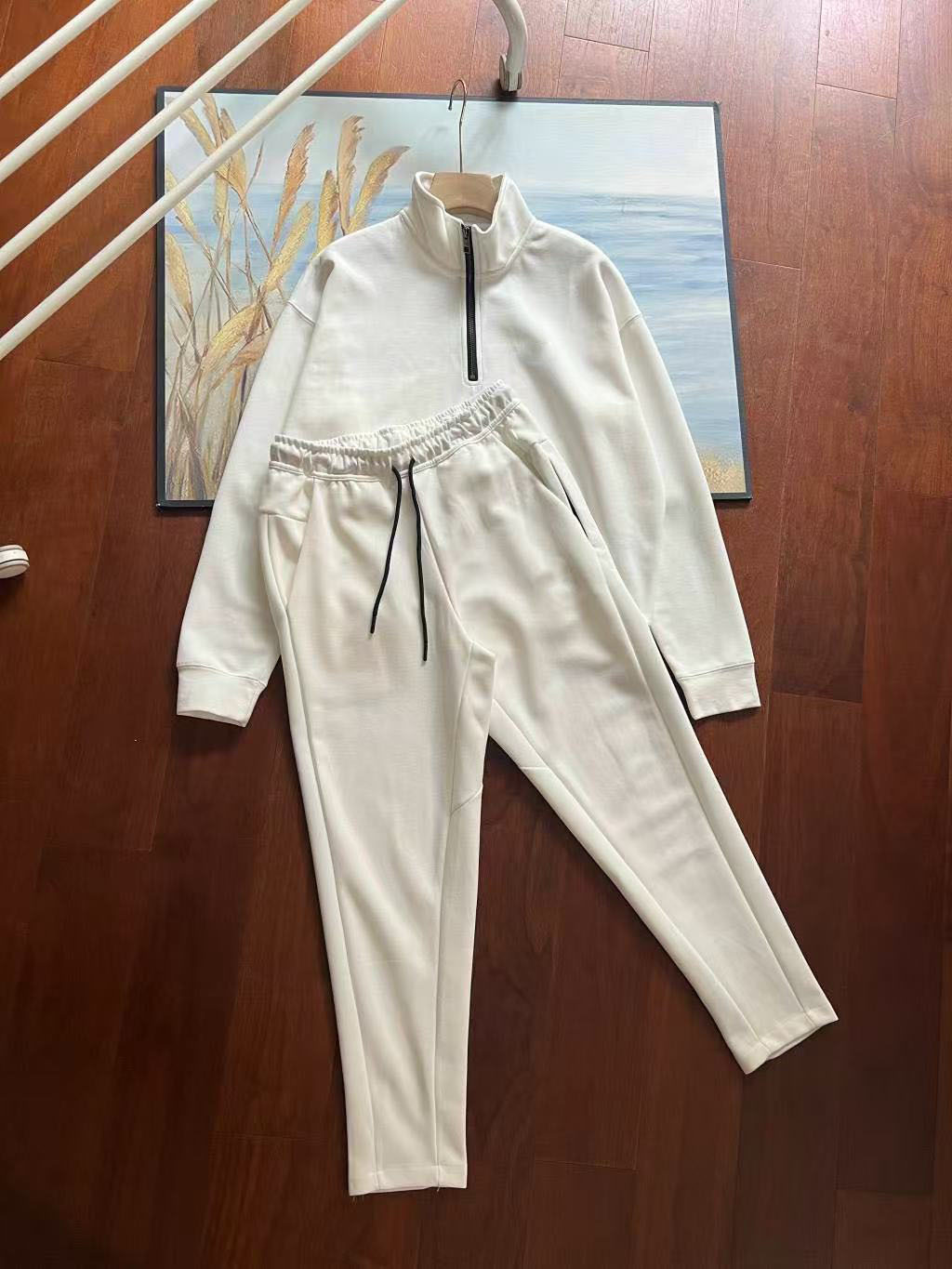 Suéter con media cremallera con cuello alto y ocio deportivo de primavera para hombre, estilo de primavera 2025, pantalones holgados deportivos 210.