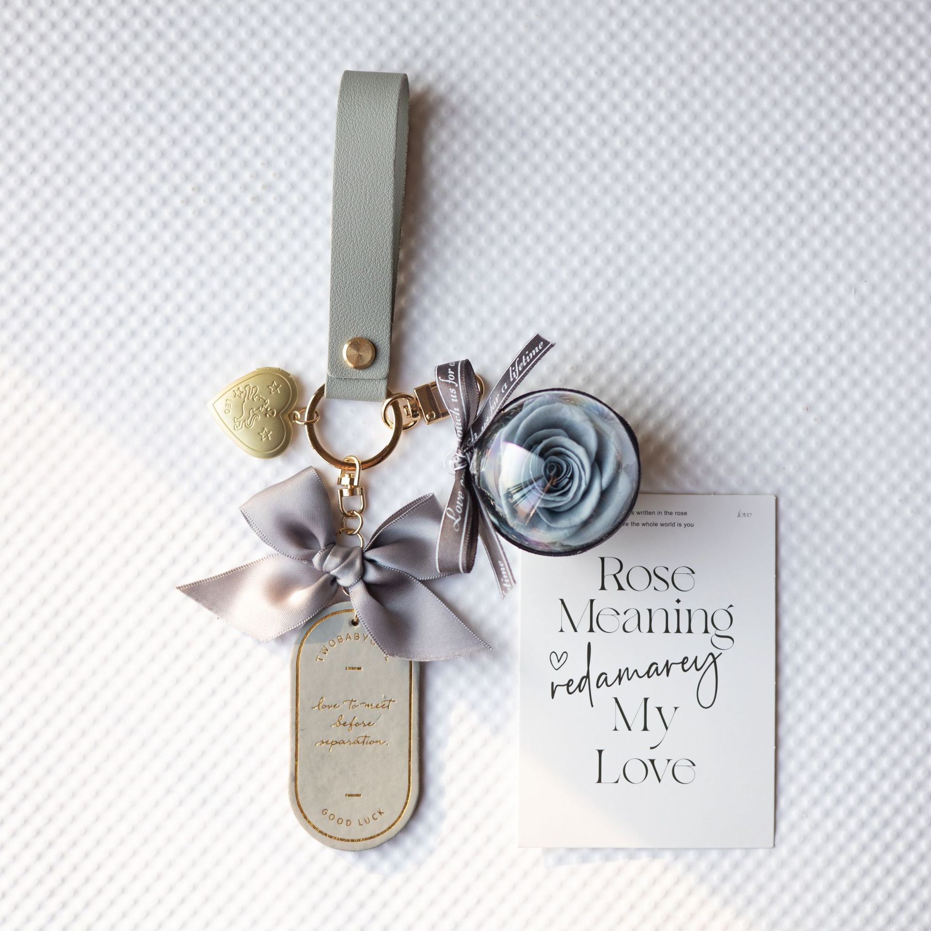 Cruz-frontera Amazon eterna flor llavero terminado Austin Rosa caja de regalo bolsa colgante de cuero marcador colgante