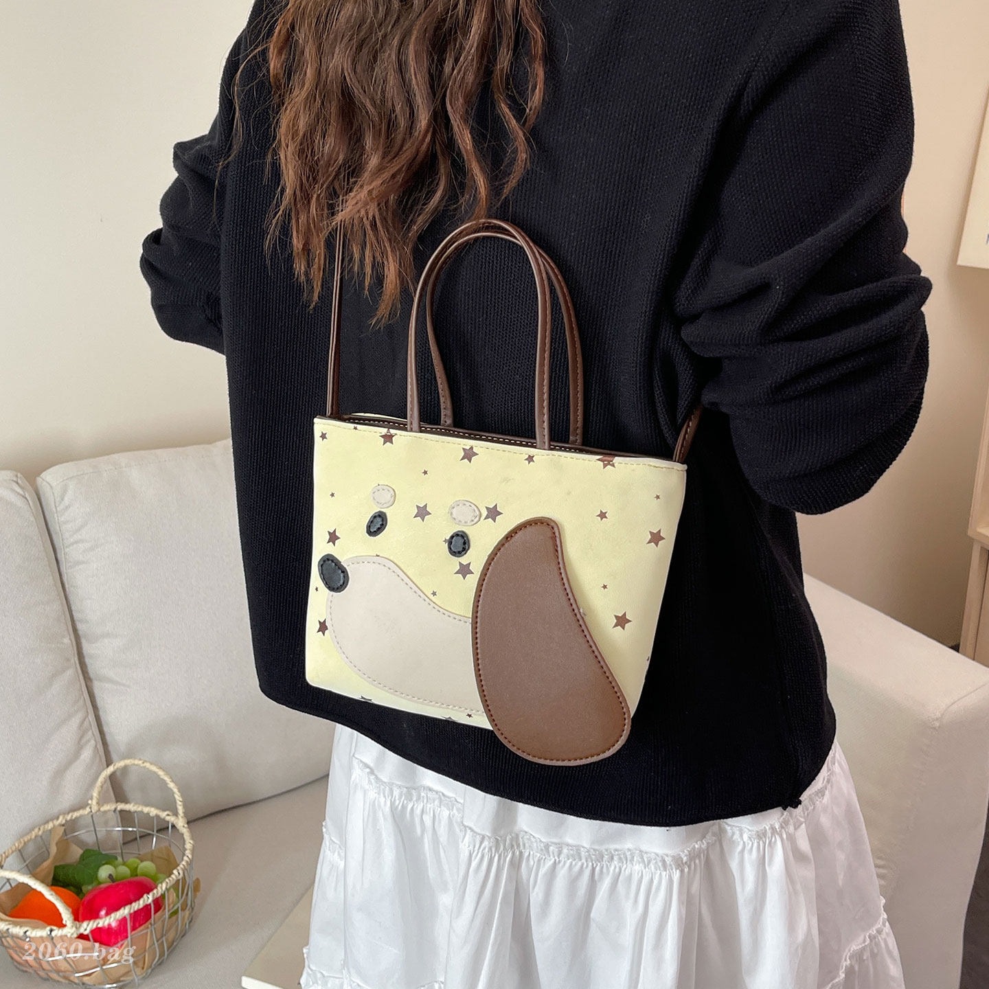 Estrellas de gran capacidad de dibujos animados temperamento perro nuevo diseño nicho mochila 2026 versión coreana de mujeres viajeros