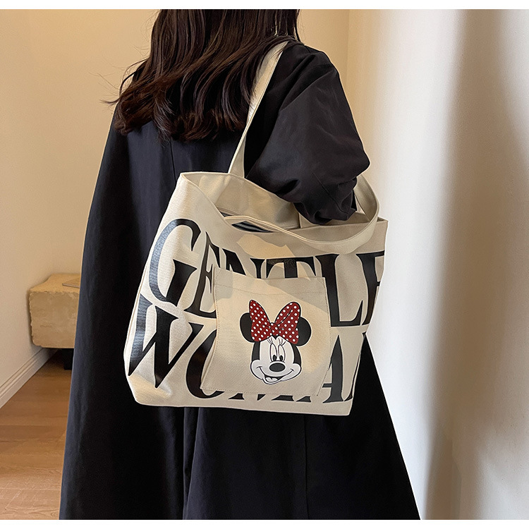 2024 New canvas bag for women, single-shoulder, student, book, large-capacity hand-held bag with zipper, versatile for office workers' commuting undefined