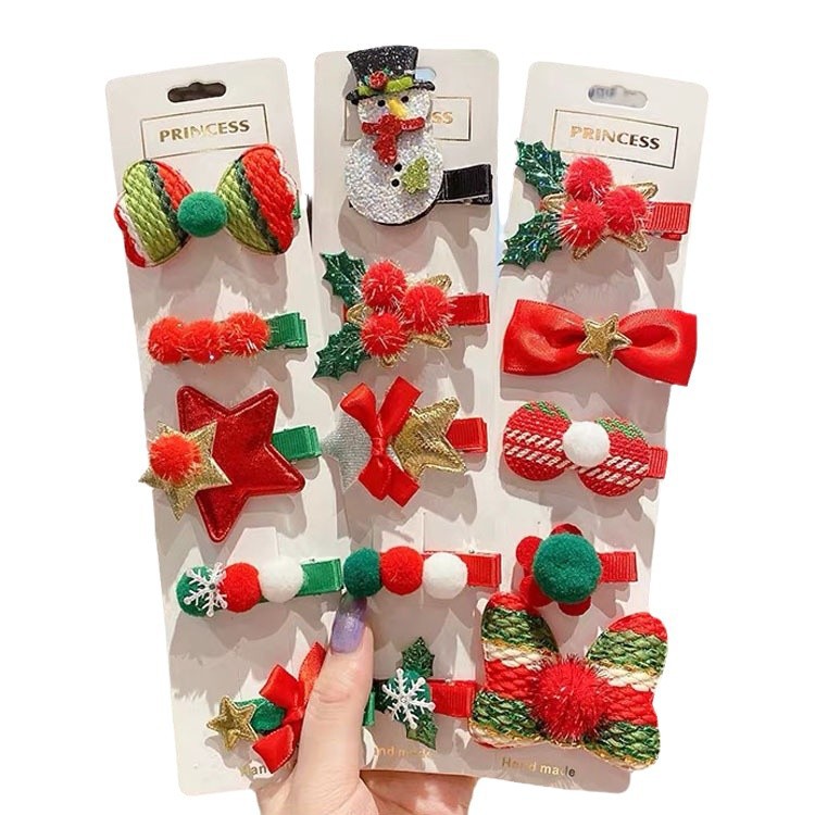 2024 nuevo clip de pelo de Navidad para niños clip de pelo de arco rojo para niñas muñeca de nieve vestido de vacaciones