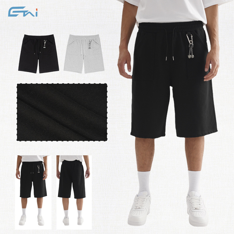 Pantalones cortos casuales de rodilla de alta calidad, pantalones cortos de hombre sueltos, pantalones de moda juveniles de siete puntos.