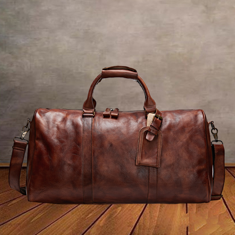 Bolso de viaje unisex de cuero transfronterizo Bolso de gimnasio de mensajero de un solo hombro Bolso de equipaje ultraligero de cuero curtido vegetal