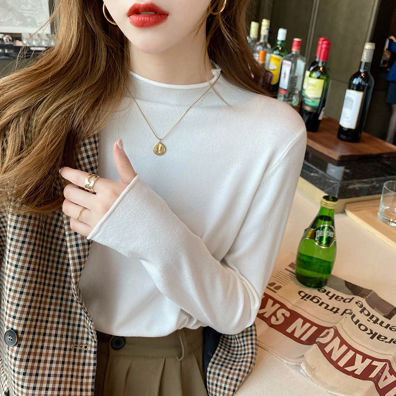 韓国版秋冬半高襟のニットの女性の薄いタイプの洋風の新型の中にセーターの長袖の上着を掛けて外に着ます。|undefined