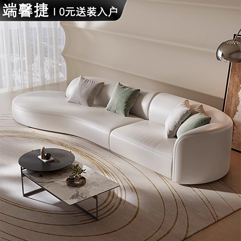 Arena de cuero real moderna simple sofá de sala de estar semi-circular pequeño tipo de casa de alta gama diseñador de viento crema sofá curvo