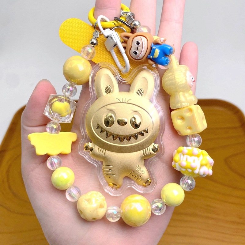 Labubu ゴールデンキーホルダー純金 999labubu ドーパミン携帯電話チェーンハンドジュエリー友人へのギフト卸売|undefined