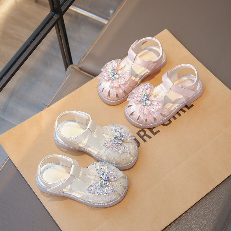 Sandálias de niñas verano 2026 nuevas niñas zapatos de sola suave para bebés mujeres zapatos de princesa de estilo romano