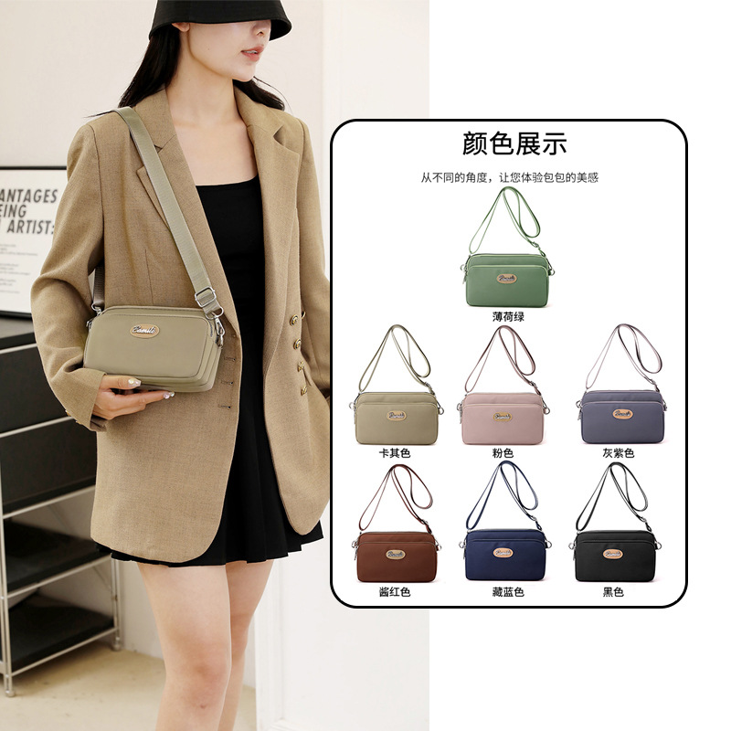 2025 nuevo estilo coreano moda transfronteriza todo fósforo Oxford tela bandolera bolso pequeño ligero casual de hombro para mujer