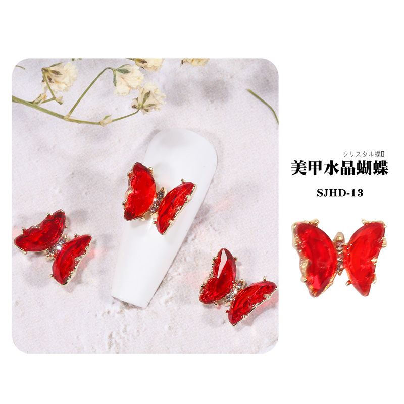 2021 nueva celebridad en línea belleza de uñas mariposa de cristal mágico estilo INS hielo tridimensional transparente Aurora diamante metal decoración de uñas