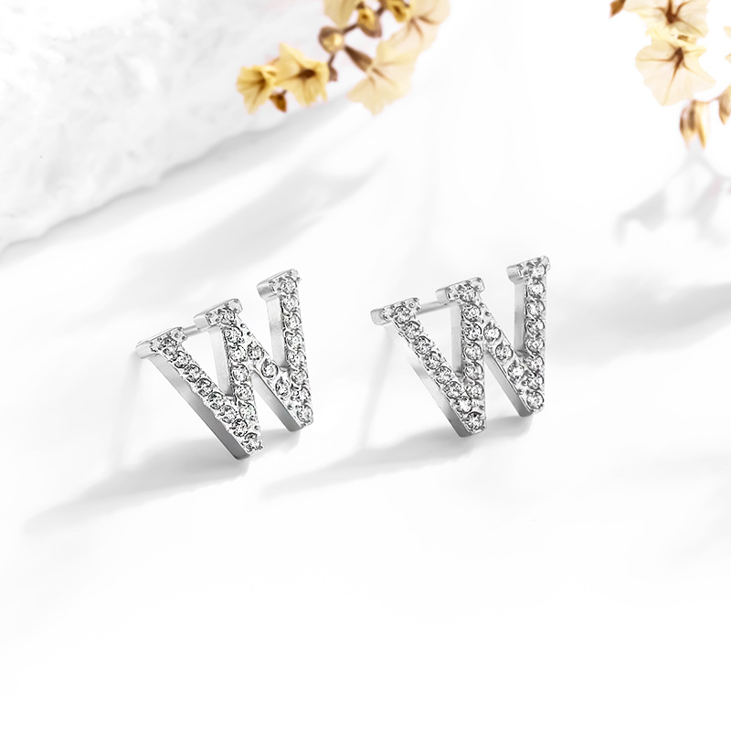 All Seasons Season 1 Pair Simple Style Letter Inlay Titanium Steel Zircon Ear Studs