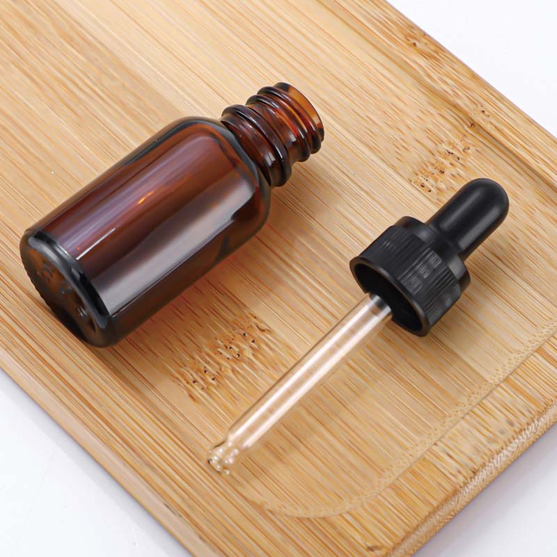 En stock: botella de aceite esencial marrón de 30 ml, botella dispensadora de vidrio de 10 ml, botella con gotero marrón de 50 ml, botella de vidrio de 20 ml.