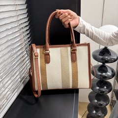外贸通勤撞色条纹手提包包女时尚斜挎包2025新款女士百搭大包