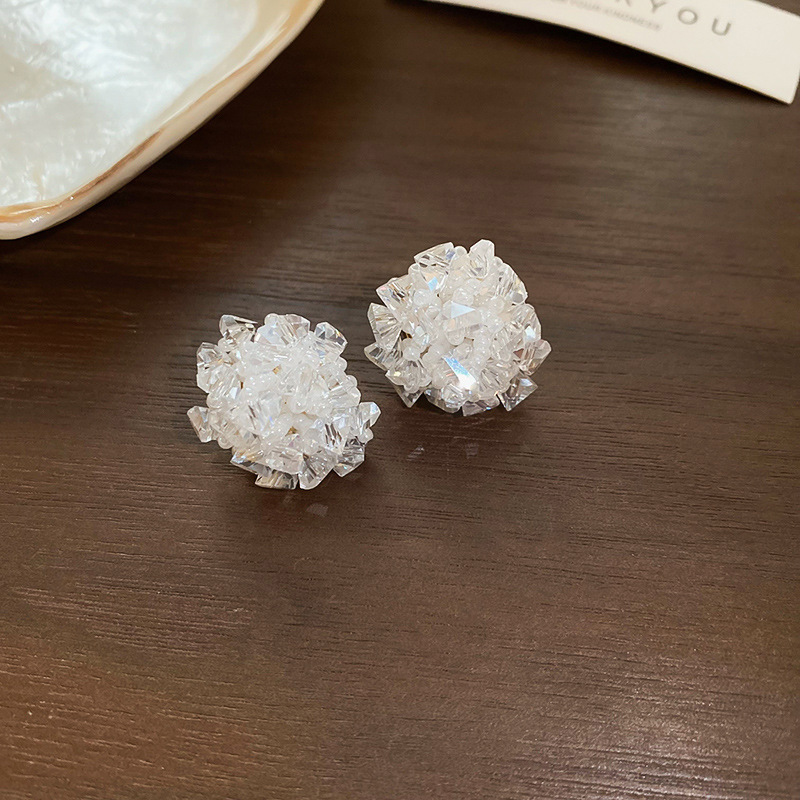 Pendientes de tejido de cristal de flor redonda de aguja de plata Pendientes de todo fósforo de viaje Pendientes de temperamento de moda femenina Sensación de nicho de alto nivel