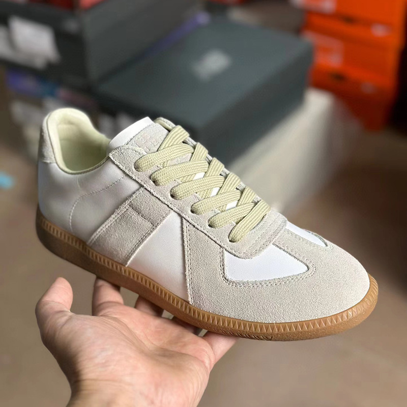 Zapatos de entrenamiento alemanes, zapatos blancos de cuero para mujer, zapatos deportivos casuales de tacón plano de todo fósforo, zapatos de entrenamiento alemanes MM6, zapatillas de deporte retro para hombre