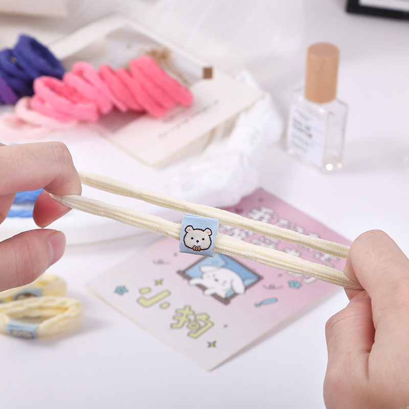 Explosiones clásicas super asequibles 10 colores anillo de cabello grueso de alta elasticidad sin costuras toalla jacquard anillo de goma cubierta de cuero