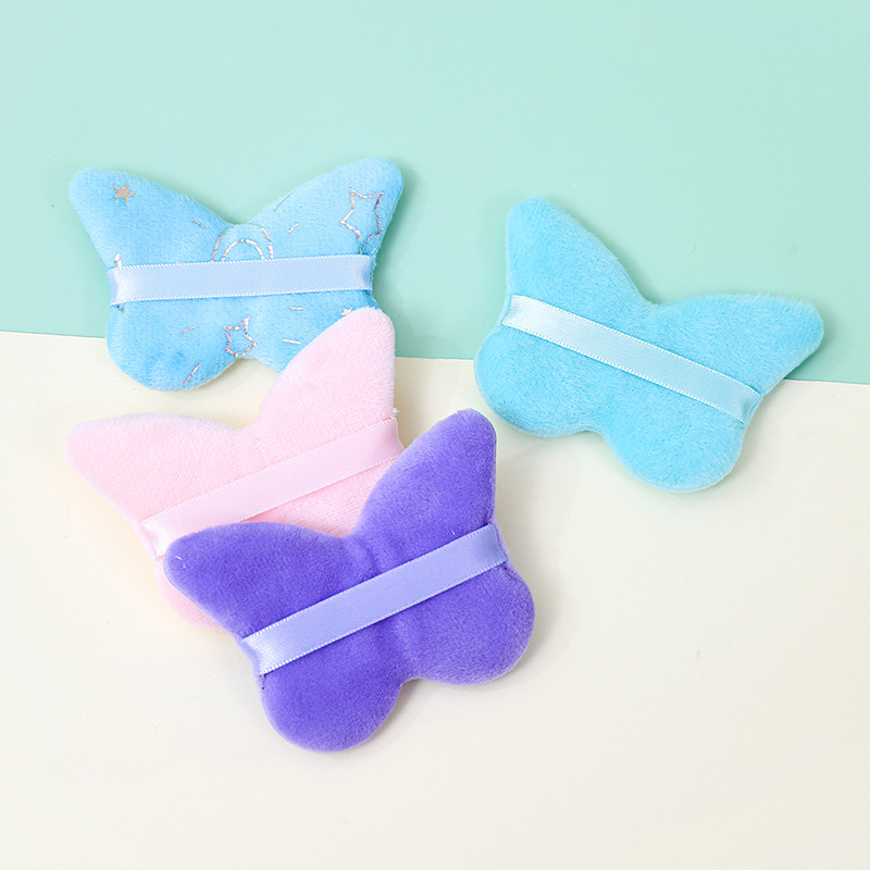 La borla de flocado corto en forma de mariposa transfronteriza no come polvo esponja de terciopelo de pie polvo suelto maquillaje maquillaje maquillaje algodón fábrica personalizado al por mayor