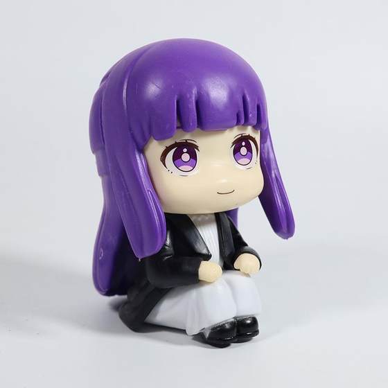 The New Product Is the Q Version of the Fuli Lian Figure That Is Buried. the Fuli Lian Feilun Hutu Big-Headed Doll Is Sitting on a Beautiful Girl's Car