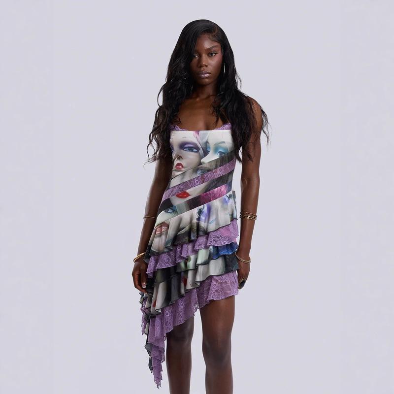 Millennial Style Retro Doll Face Print Tube Top Dress with Contrasting Purple Lace, Asymmetrical Ruffles, and Spicy Short Skirt Millennial Style Retro Doll Face Print Tube Top Dress with Contrasting Purple Lace, Asymmetrical Ruffles, and Spicy Short Skirt