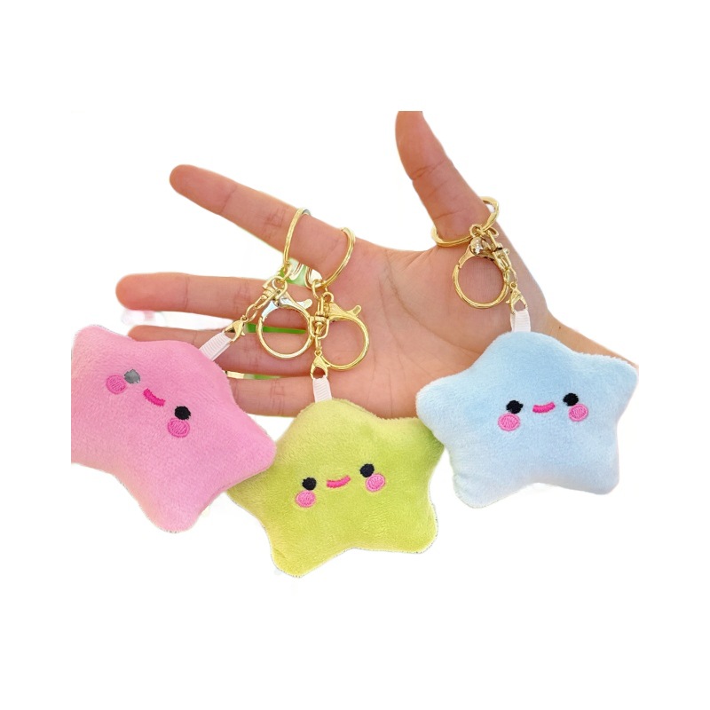 Creativa pequeña estrella llavero de peluche estrella mochila muñeca colgante muñeca juguete al por mayor
