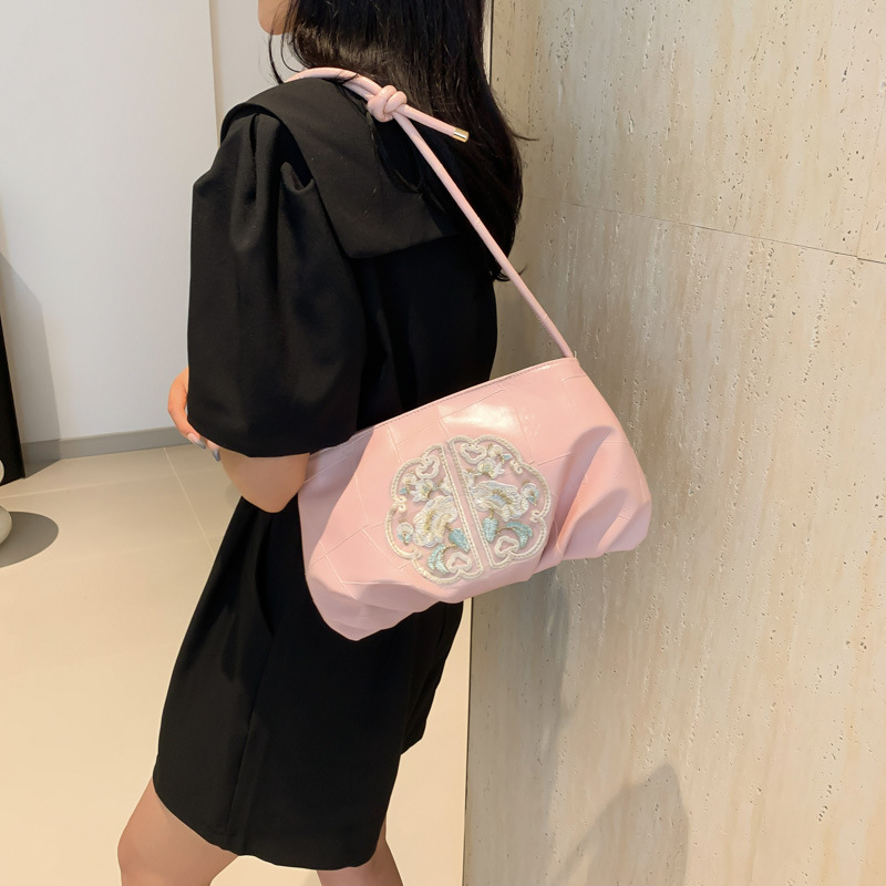 Nuevo estilo chino bordado bolso pequeño mujer 2024 nuevo plegado estilo extranjero empalme viaje al trabajo mochila de hombro