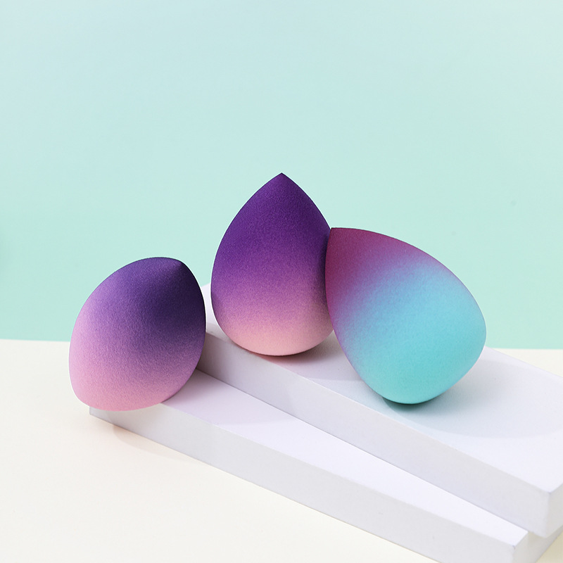 Huevo de belleza de color degradado, soplo de polvo, poliuretano transfronterizo, gotas de agua, esponja de maquillaje, maquillaje, fábrica de huevos, venta al por mayor personalizada