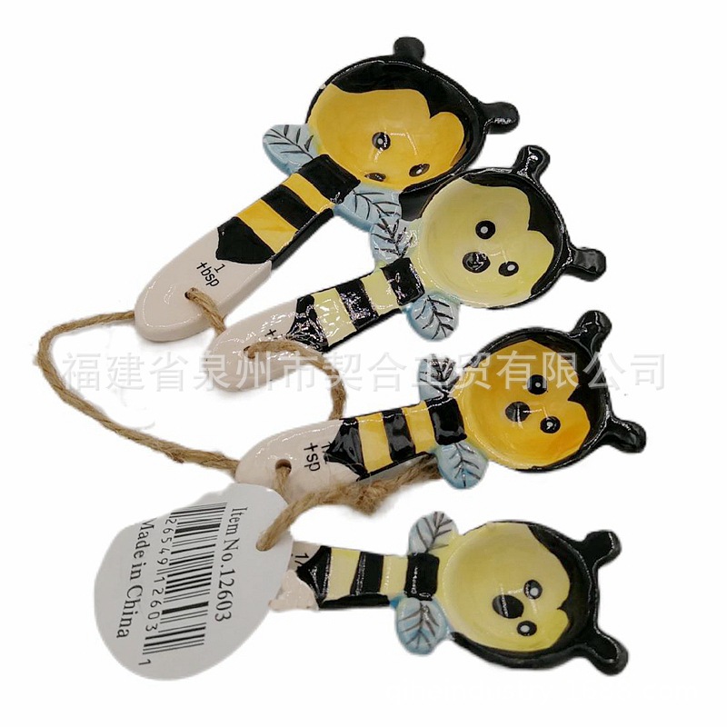 Cute Cat Cuchara medidora de cerámica Juego de cuatro piezas Cuenco de cocción de cocina Juego de taza medidora de cerámica creativa de Amazon de dibujos animados