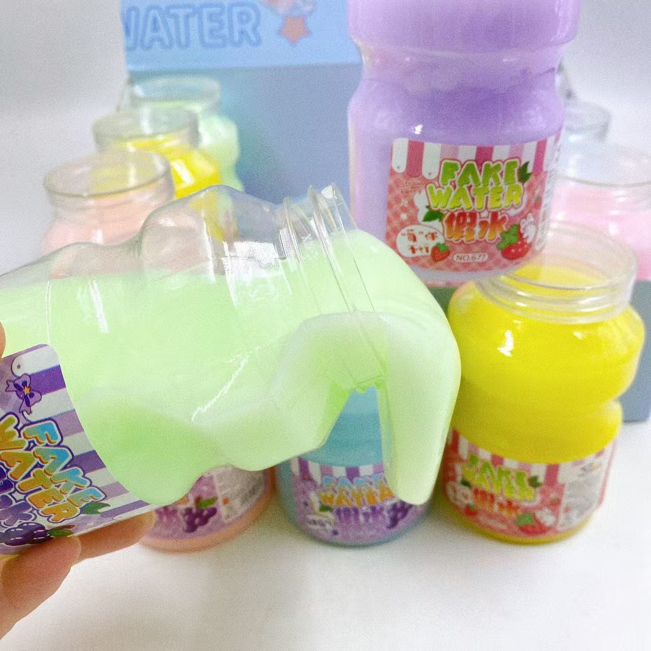 Barro de cristal de agua falsa de color, lodo de la babosa de Slime, lodo de burbujas de cemento falso, descompresión, botella grande hecha a mano, lote de 330g