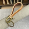 Caramel cowhide + bronze hardware (zinc alloy)