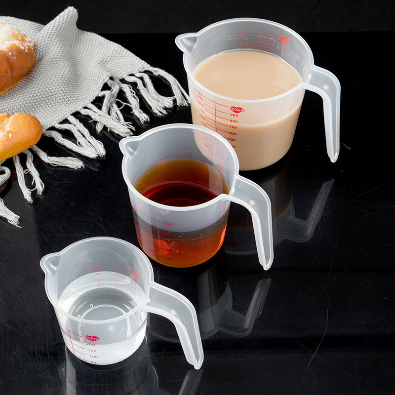 Heat-resistant measuring cup scaled