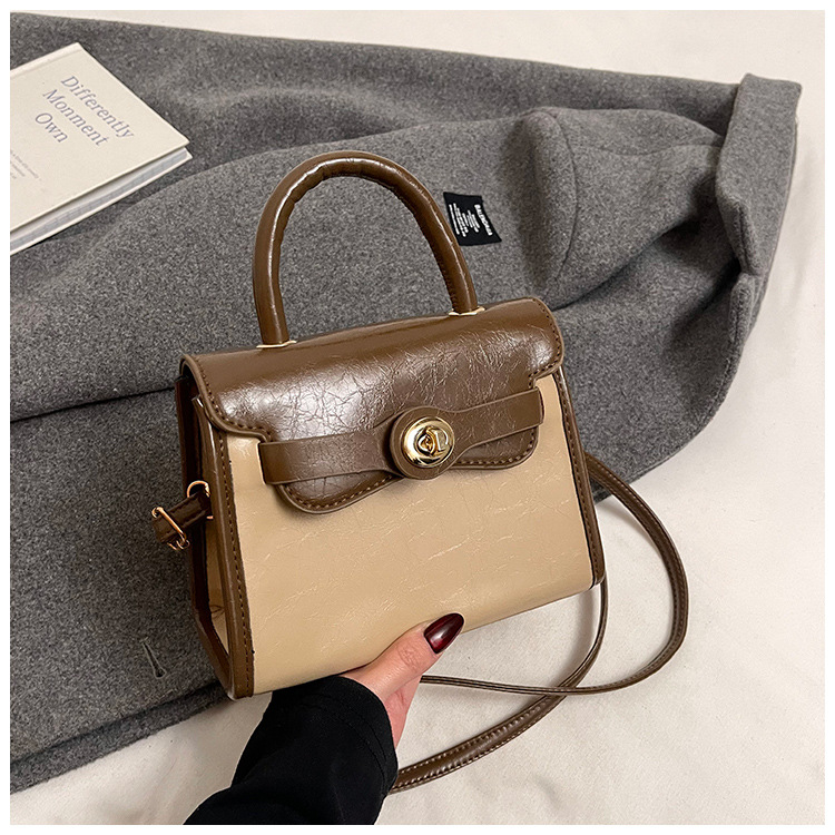 Moda 2025 primavera y verano nueva versión coreana de la retro Kelly bolso femenino 100 bolsos de hombro, nicho, bolso casual simple