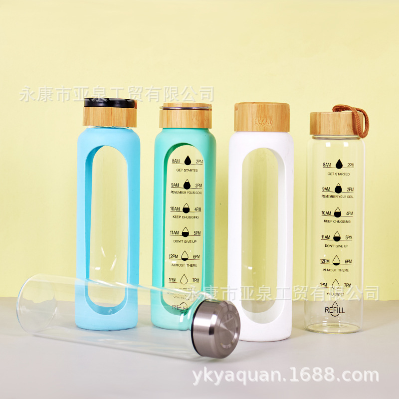 Cubierta de bambú transfronteriza de vidrio aislado de gran capacidad de una sola capa de vidrio de borosilicato taza de agua con taza de silicona cubierta protectora al por mayor