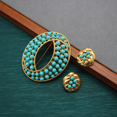 Elegant European and American niche design, emerald green poster-style brooch and earring set, celadon imitation jade, heart-shaped book design