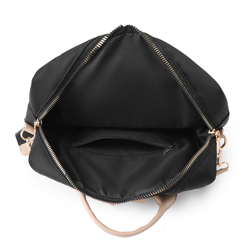 Bolsos para mujer 2023 nueva mochila casual para mujer de nailon Mochila de viaje al aire libre simple y ligera urbana al por mayor