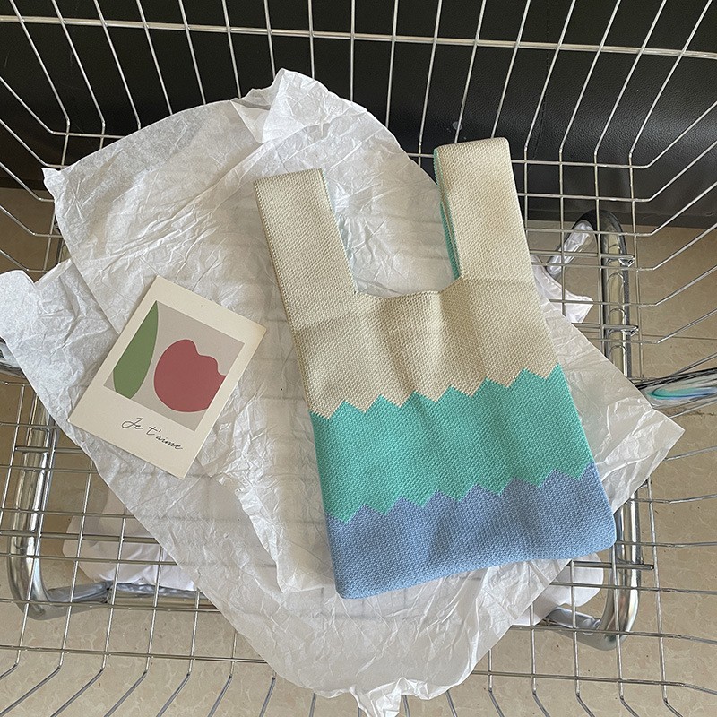 Ins versión coreana de primavera y verano nuevos bolsos de mujer, bolsos de mano, bolsos de punto de nicho simples, bolsos de chaleco, bolsos de mensajero