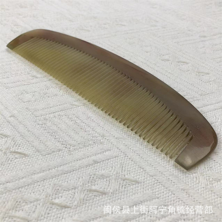 Natural Goat Horn Comb 18cm Wide Tooth Massage Comb for Scalp Meridian Care and Gua Sha in use