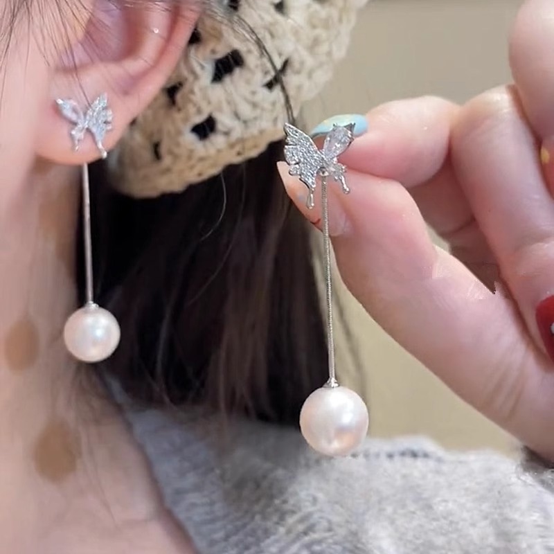 Sophisticated fashionable universal earrings with bow with zircon…
