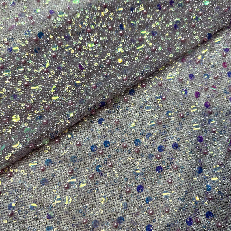 Fabricantes de comercio exterior transfronterizo punto bordado de polvo de polvo brillante tela vestido de boda ropa de moda tela