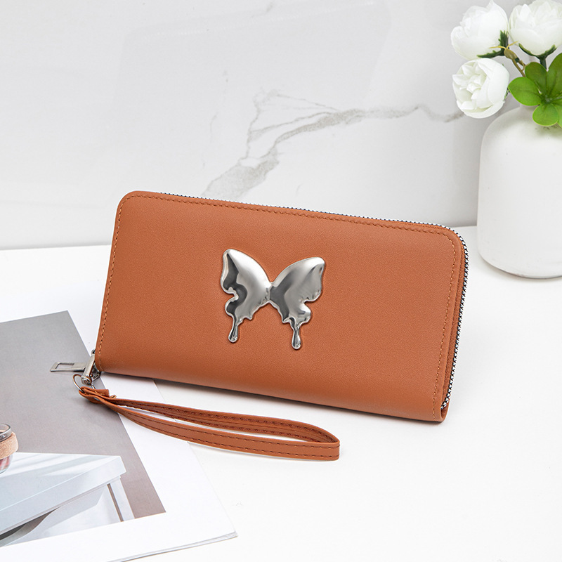 Nicho coreano 2024 mariposa metálica decoración PU material compacto exquisito lindo bolso de mano de mujer