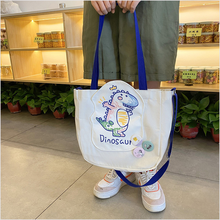 Cute Crossbody Large Capacity Canvas 2021 New Ins Japanese One Shoulder Women's Bag Cute Sister Portable Tote Bag display picture 11