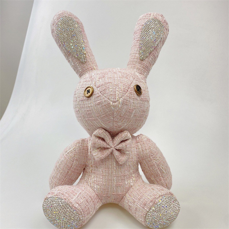 부드러운 핑크 줄무늬 다이아몬드 박힌 토끼