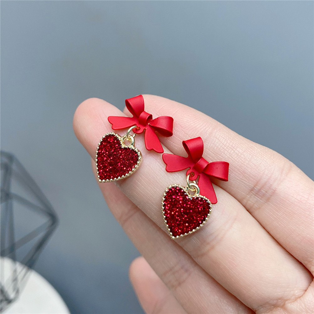 Simple Red Heart Earrings Cute Korean Bow Alloy Drop Earrings display picture 4