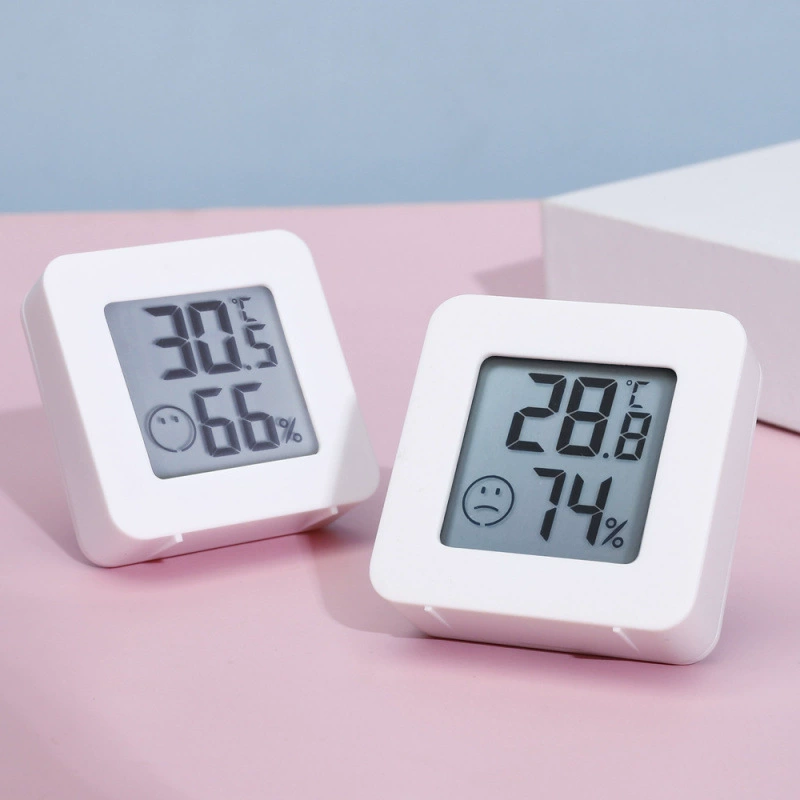 Цифровой термометр смайлики отображает внутренний электронный термометр