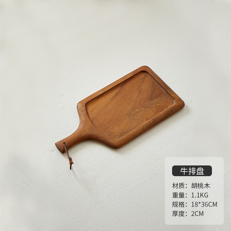 木のステーキの食事皿日本式の木のピザの皿の牛の板の食器の木の皿の木のトレーの洋食は皿を並べます。|undefined