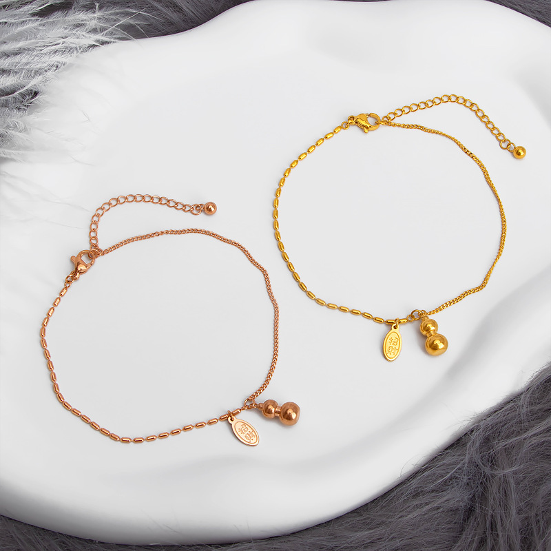 Wenjian 2022 nueva pulsera de acero de titanio japonés y coreano de la suerte de tobillo redondo nicho femenino no se desvanece pequeña calabaza colgante pie