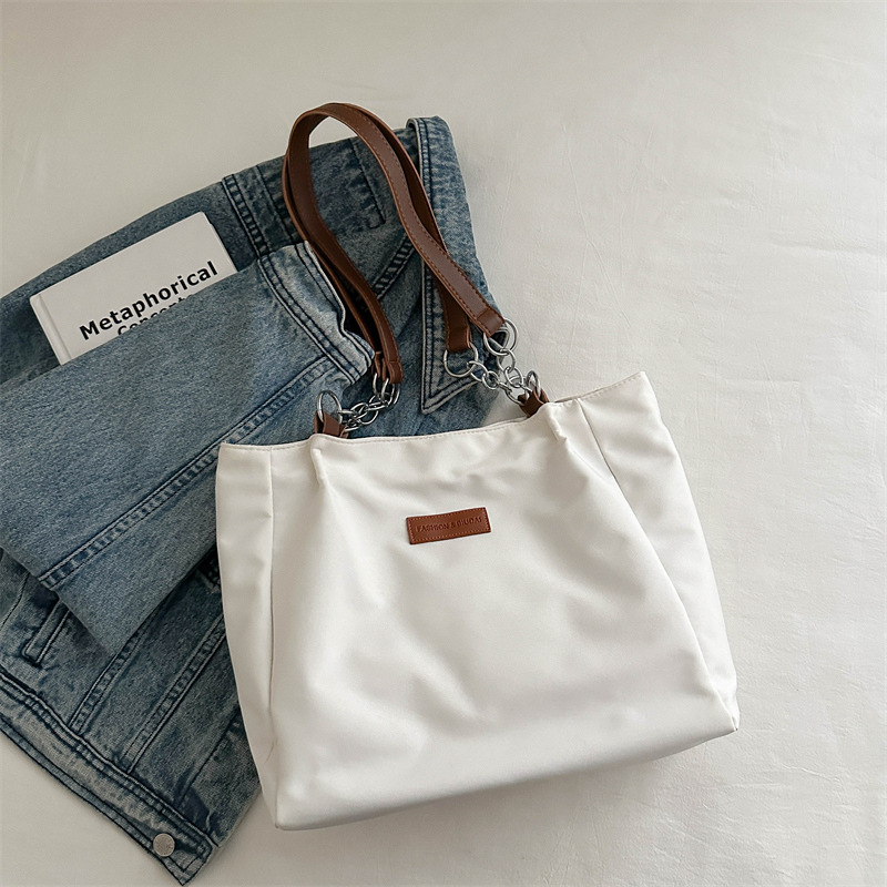Casual bolsa de viaje de gran capacidad para mujeres 2024 nueva moda bolsa de lona universal bolso de hombro universal bolso simple